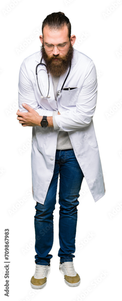Young blond doctor man with beard wearing medical coat with hand on stomach because nausea, painful disease feeling unwell. Ache concept. Young blond doctor man with beard wearing medical coat with hand on stomach because nausea, painful disease feeling unwell. Ache concept.