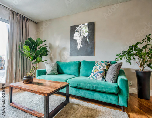 A sleek Scandinavian living room  featuring a designer mint sofa  modern furniture  mock-up poster map  vibrant plants  and tasteful personal accessories for a curated and stylish ambiance.