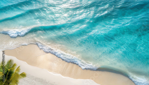 abstract turquoise water wave with sunlight on white sand beach from above, empty summer vacation background banner with copy space for travel and natural beauty spa