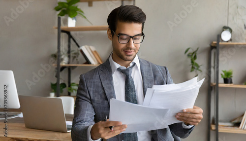 Accountant showing office document auditing concept ,plan review process and assess correctness ,Management of important document storage of organization ,document system ,accountant Audit documents photo