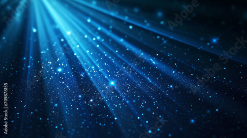 Abstract dark blue light rays digital background with sparkling blue light particles , surfaces and grids