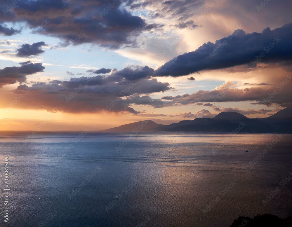 Fototapeta premium Beautiful cloudscape over the sea with sky clouds at sunset