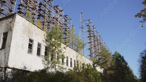 View of Duga horizon radar system through abandoned building in Chernobyl, Ukraine 