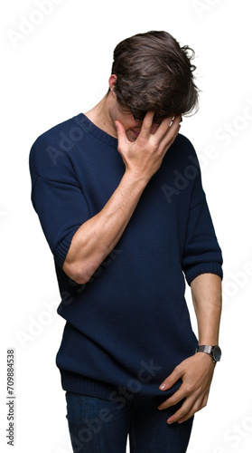 Young handsome man wearing glasses over isolated background with sad expression covering face with hands while crying. Depression concept.