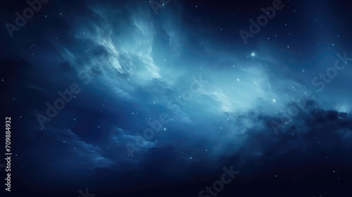 Ethereal cosmic nebula with stars in shades of blue background © dvoevnore