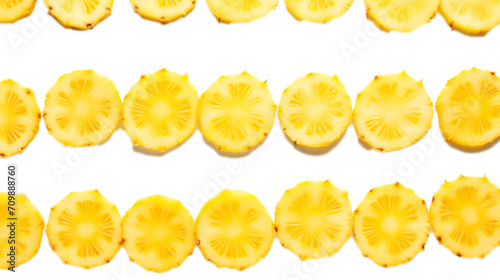 Juicy pineapple slices arranged elegantly on a pristine white background.
