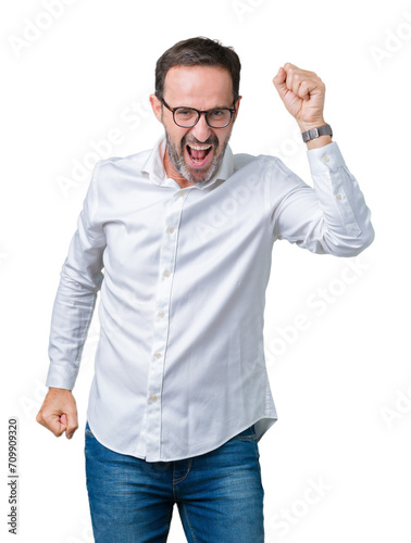 Handsome middle age elegant senior business man wearing glasses over isolated background Dancing happy and cheerful, smiling moving casual and confident listening to music