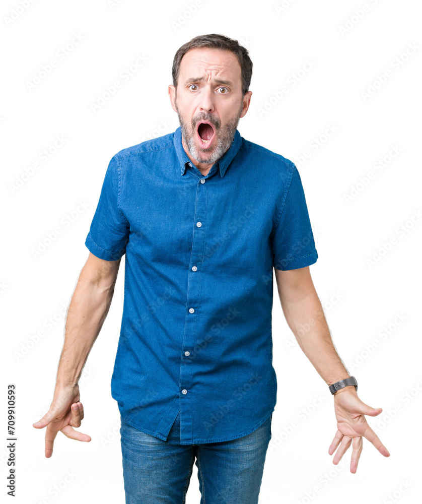 Handsome middle age elegant senior man over isolated background In shock face, looking skeptical and sarcastic, surprised with open mouth Handsome middle age elegant senior man over isolated background In shock face, looking skeptical and sarcastic, surprised with open mouth