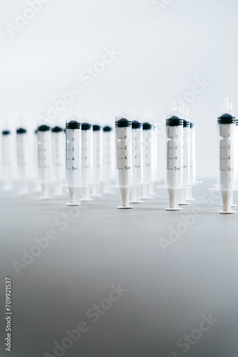 Ordered and perfect composition of syringes after manufacturing and prepared for medical and surgical use