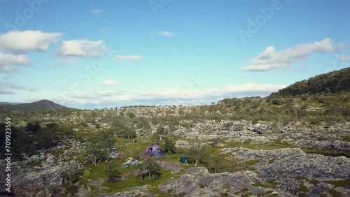 Drone footage over river in nature with beautiful landscape.  Lakselv, Norway photo