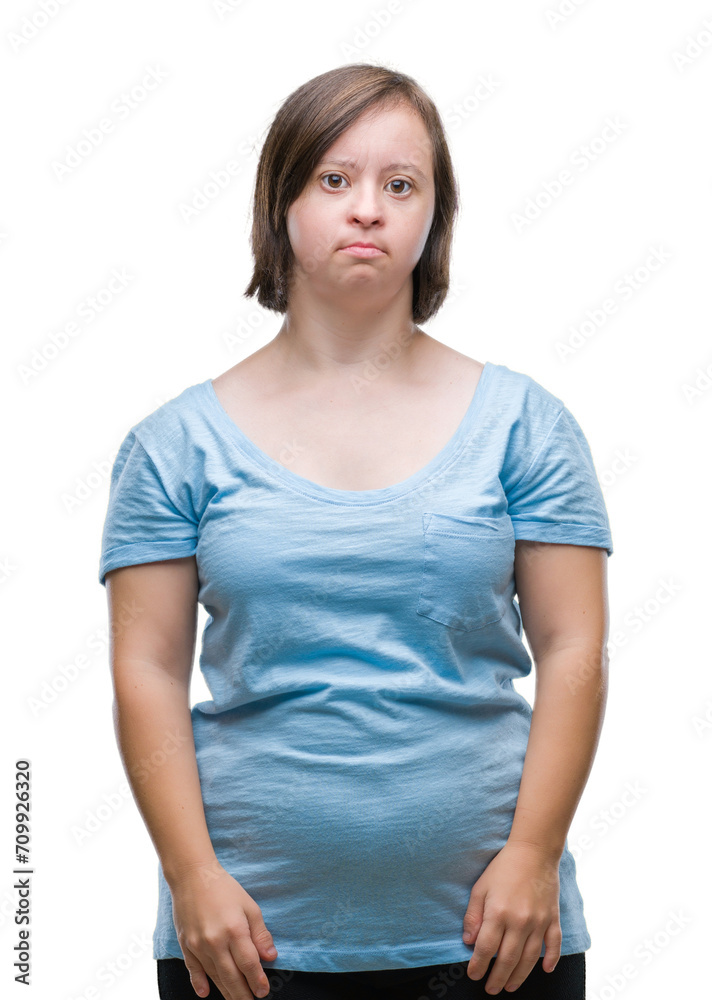 Young adult woman with down syndrome over isolated background with serious expression on face. Simple and natural looking at the camera. Young adult woman with down syndrome over isolated background with serious expression on face. Simple and natural looking at the camera.