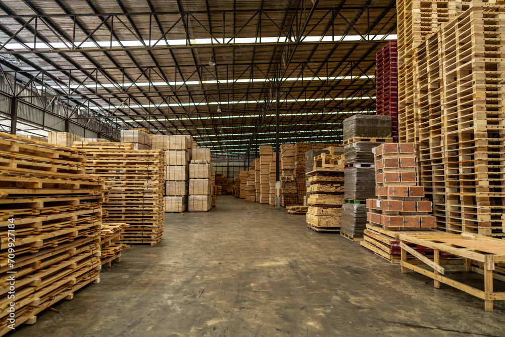 background of pallet wood in warehouse. pattern wood section. Grid of wood squares. the raw of material timber on stack. background of pallet wood in warehouse. pattern wood section. Grid of wood squares. the raw of material timber on stack.