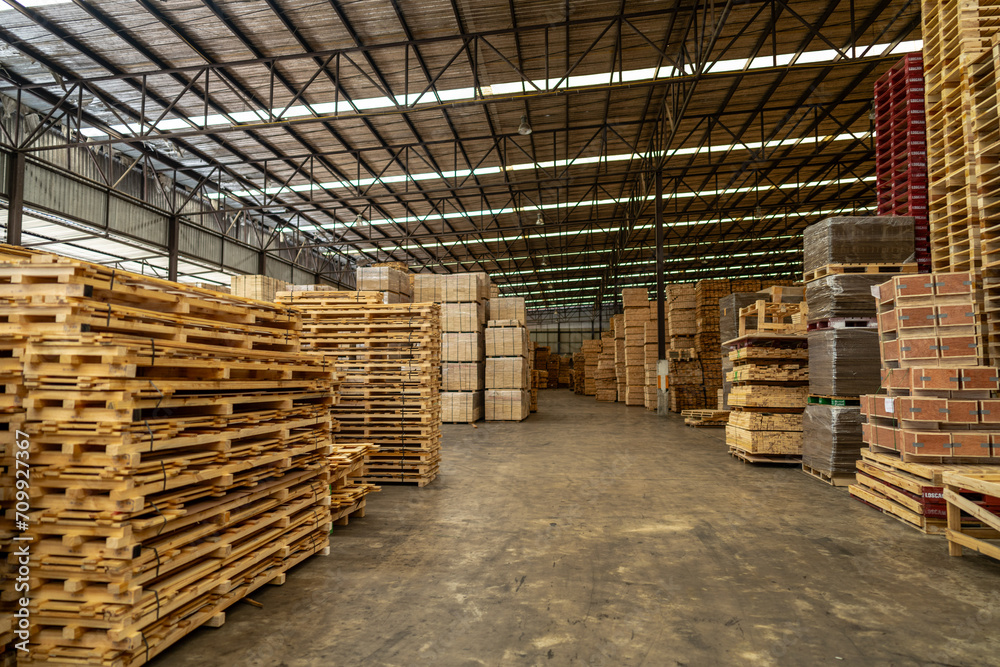 background of pallet wood in warehouse. pattern wood section. Grid of wood squares. the raw of material timber on stack. background of pallet wood in warehouse. pattern wood section. Grid of wood squares. the raw of material timber on stack.