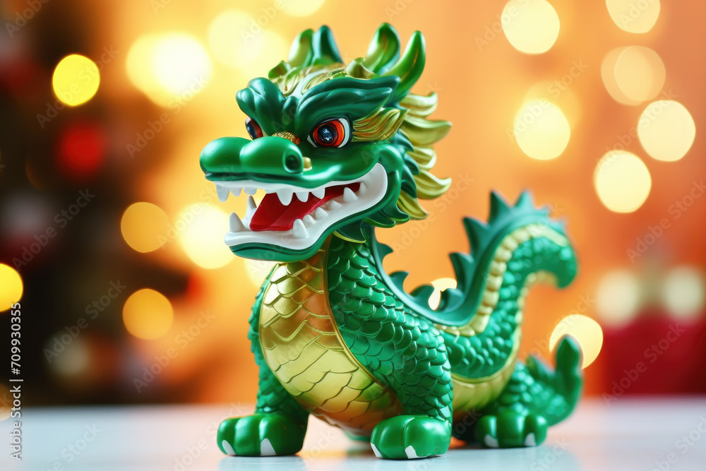 Fototapeta premium Green dragon toy close up, symbol of a Chinese year 