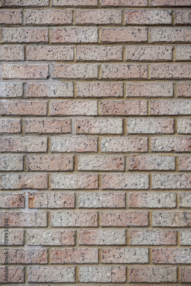 Modern beige brick wall background texture. Home and office interior design backdrop.	
