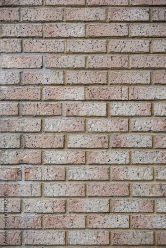 Modern beige brick wall background texture. Home and office interior design backdrop.  