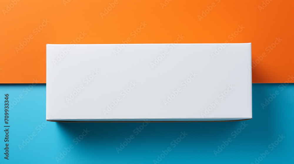 There is an open rectangular empty white box on an orange table, a blue ribbon lies next to it created with Generative Ai There is an open rectangular empty white box on an orange table, a blue ribbon lies next to it created with Generative Ai