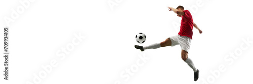 Precision in Flight. Football player kicks ball into air, creating visual masterpiece against white background with negative space to insert text. Concept of sport games, energy, world cup season. Ad
