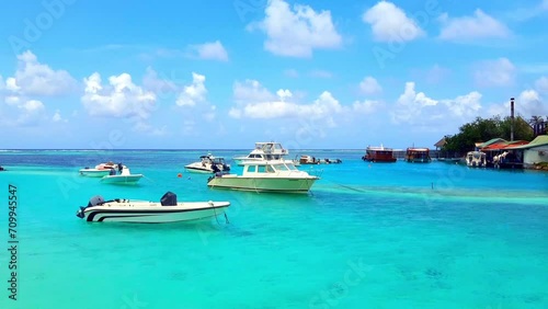 Huraa Island - Maldives - fantastic view of the lagoon with its boats photo