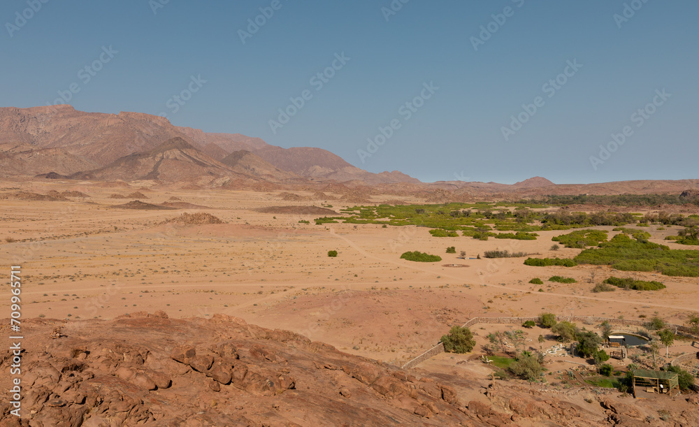Gravel roads meander through a rocky area on the edge of the Namib desert in the Erongo district of northwestern Namibia.