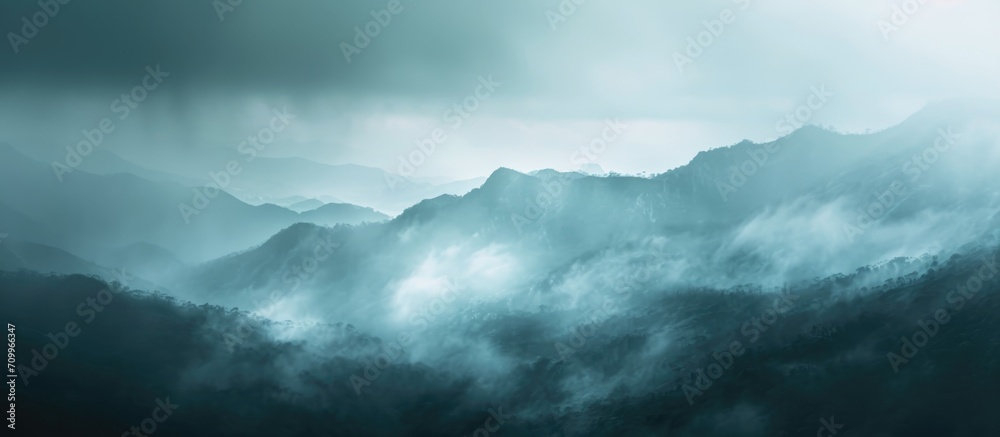 Abstract, foggy landscape with mountains and a dark background during rainy nature. Abstract, foggy landscape with mountains and a dark background during rainy nature.