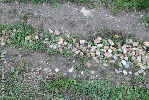 stones on the road village countryside in summer