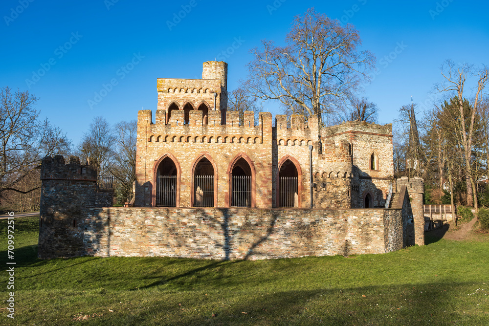 View of the Mosburg, an artificial ruin on the edge of the Mosburgweiher, fed by the Mosbach, in the Biebrich Castle Park in Wiesbaden