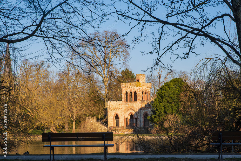 View of the Mosburg, an artificial ruin on the edge of the Mosburgweiher, fed by the Mosbach, in the Biebrich Castle Park in Wiesbaden