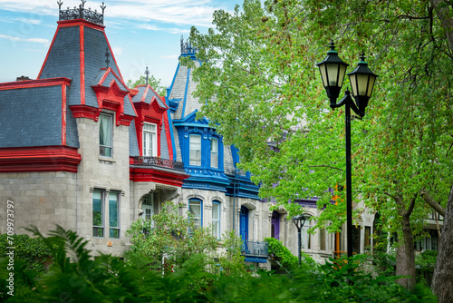Colorful victorian houses in Le plateau Mont Royal borough in Montreal, Quebec photo