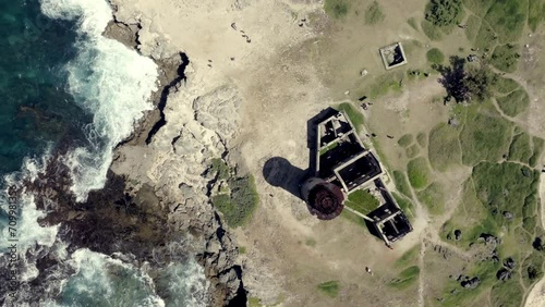 Drone footage over small islands in the Indian Ocean with old ruin. Mauritius photo