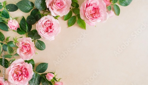 vertical image of pink roses frame on pastel background top view beautiful floral template with copy space