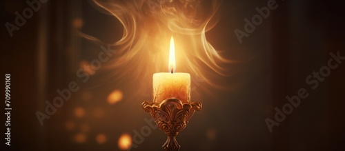 Light from a candle and its flickering glow.