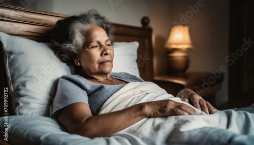 elderly woman, old woman lying in bed, sad humble mood