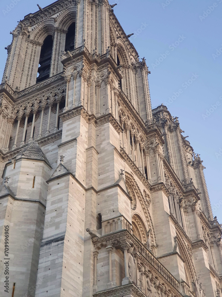 Notre Dame Cathedral, an iconic masterpiece of Gothic architecture, stands gracefully against the Parisian skyline, narrating tales of history, faith, and breathtaking beauty