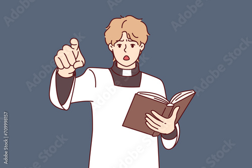 Catholic priest with bible reads sermon and points finger at screen, talking about dangers of sins. Priest in white robe opens mouth in shock, calling to observe instructions of old testament