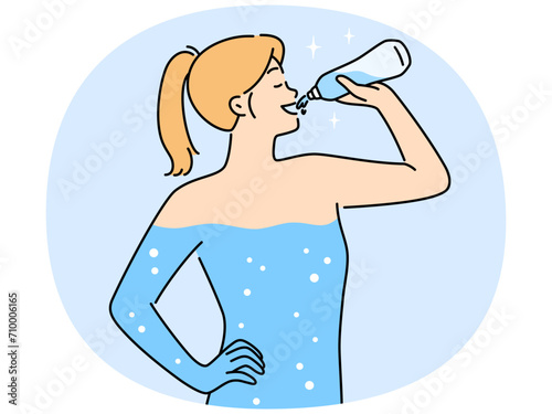 Young woman drinking water for body hydration