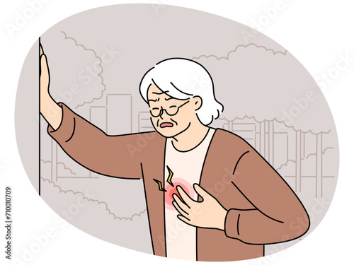 Unhealthy elderly woman suffer from heart attack