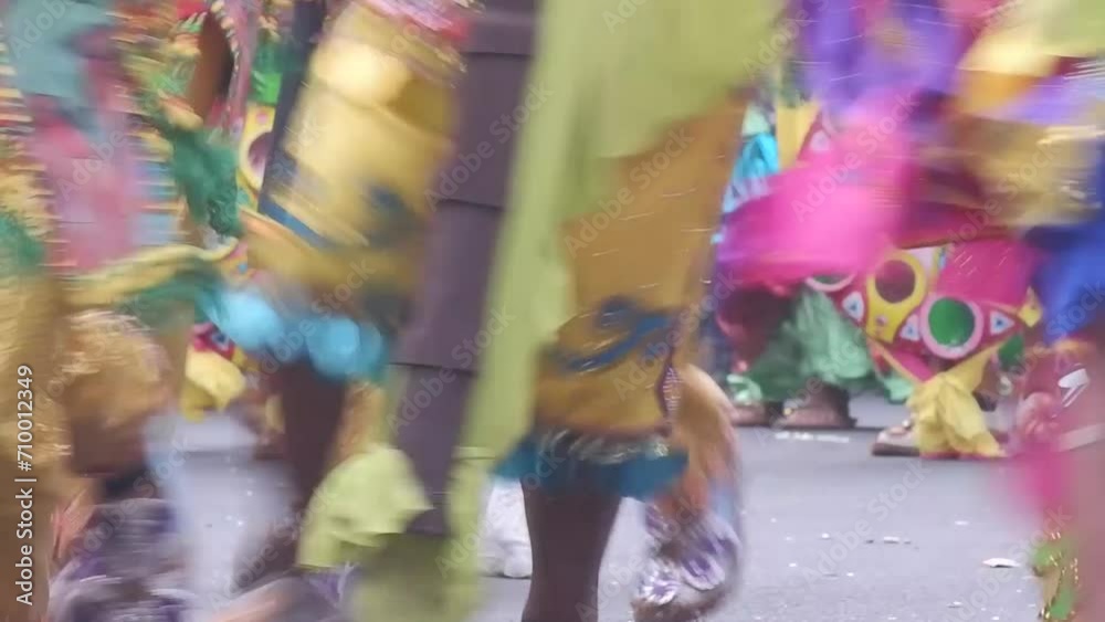 Street dancers in various local and colorful native costumes perform in a frenzy along the street to pay homage to a Patron Saint during the annual celebration of the coconut festival. Street dancers in various local and colorful native costumes perform in a frenzy along the street to pay homage to a Patron Saint during the annual celebration of the coconut festival.