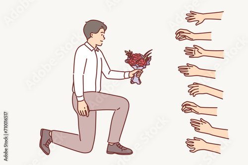 Seductive man with bouquet of flowers is popular with women want to date lavilas