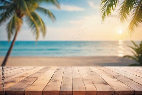 Top of wood table with seascape and palm tree, blur bokeh light of calm sea and sky at tropical beach background photo