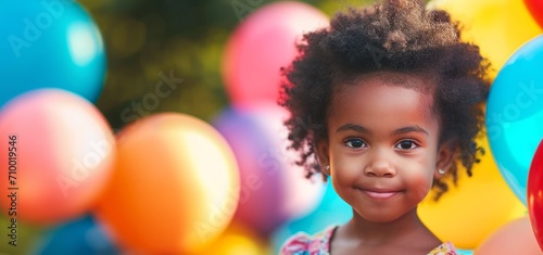 African American child against a background of colorful