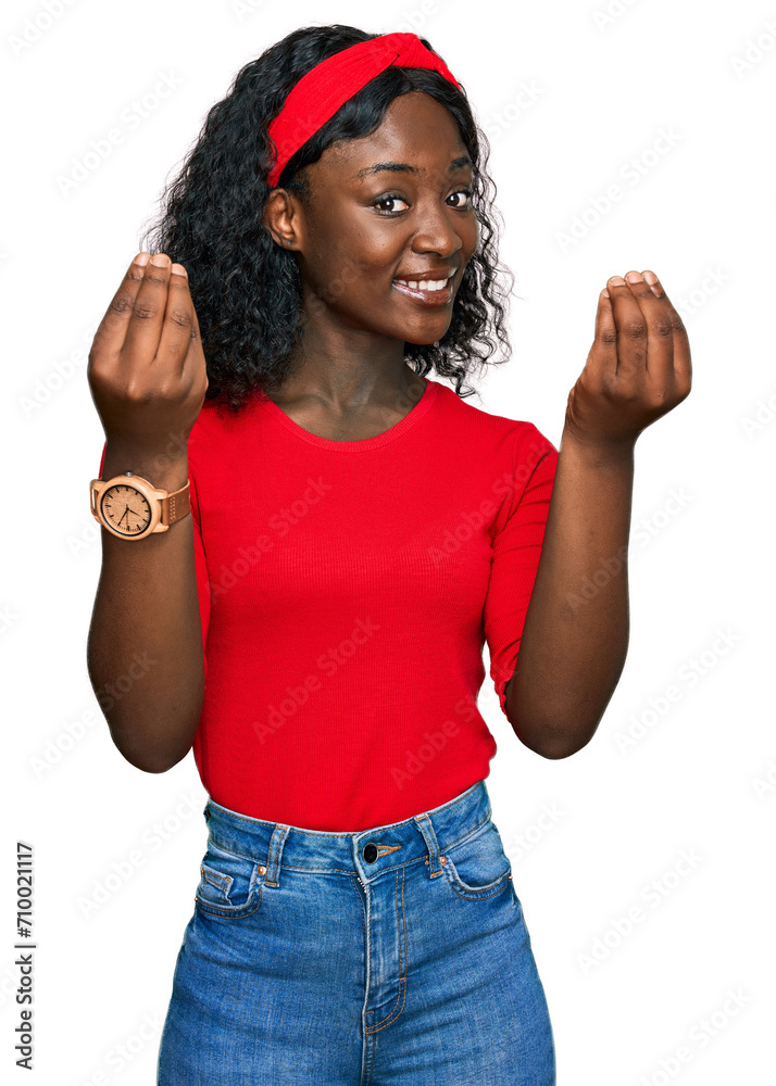 Beautiful african young woman wearing casual clothes doing money gesture with hands, asking for salary payment, millionaire business Beautiful african young woman wearing casual clothes doing money gesture with hands, asking for salary payment, millionaire business