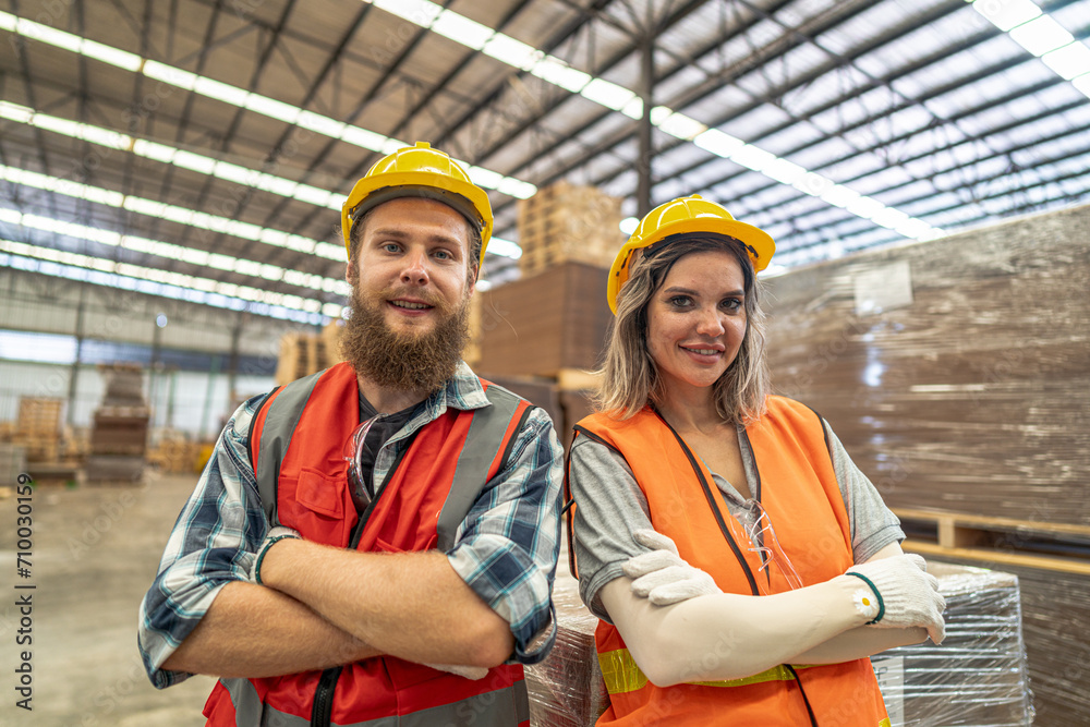 workers man and woman engineering walking and inspecting timbers wood in warehouse. Concept of smart industry worker operating. Wood factories produce wood palate. workers man and woman engineering walking and inspecting timbers wood in warehouse. Concept of smart industry worker operating. Wood factories produce wood palate.