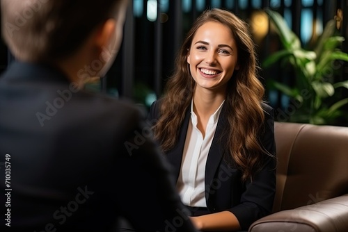  Confident Businesswoman in Meeting with Colleague