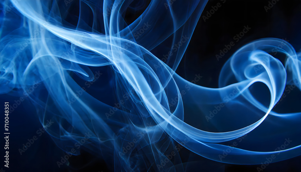 Fototapeta premium Blue smoke on black background wallpaper.
