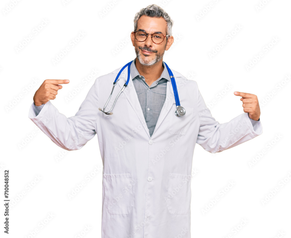 Middle age grey-haired man wearing doctor uniform and stethoscope looking confident with smile on face, pointing oneself with fingers proud and happy. Middle age grey-haired man wearing doctor uniform and stethoscope looking confident with smile on face, pointing oneself with fingers proud and happy.