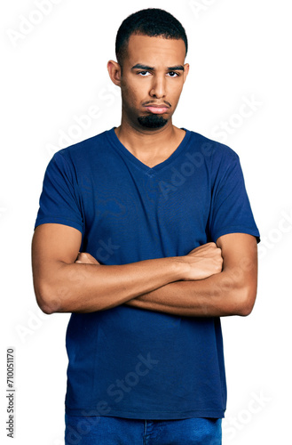 Young african american man with arms crossed gesture depressed and worry for distress, crying angry and afraid. sad expression.