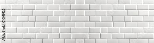 White stone wall or white colored brick or tile, rough grainy surface, concret wall design background texture, banner 
