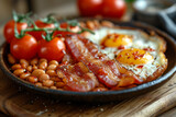 beans with tomatoes, english breakfast on a dark plate