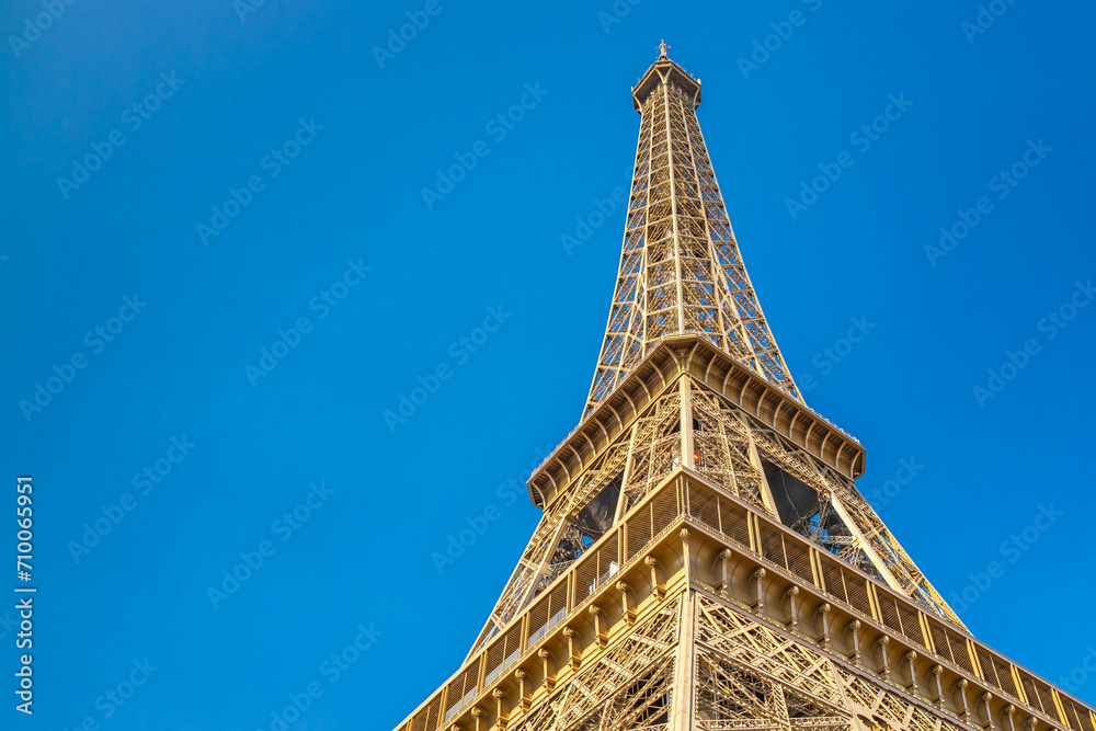 Eiffel Tower on a summer day with a clear blue sky in Paris, France